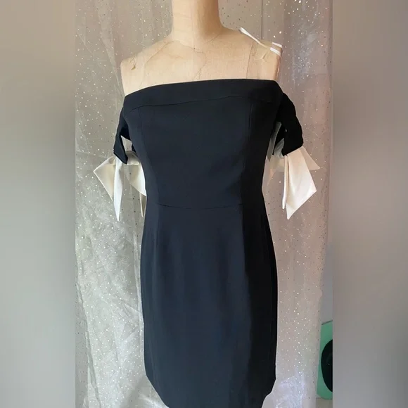 Boston Proper black dress with white bow detail.